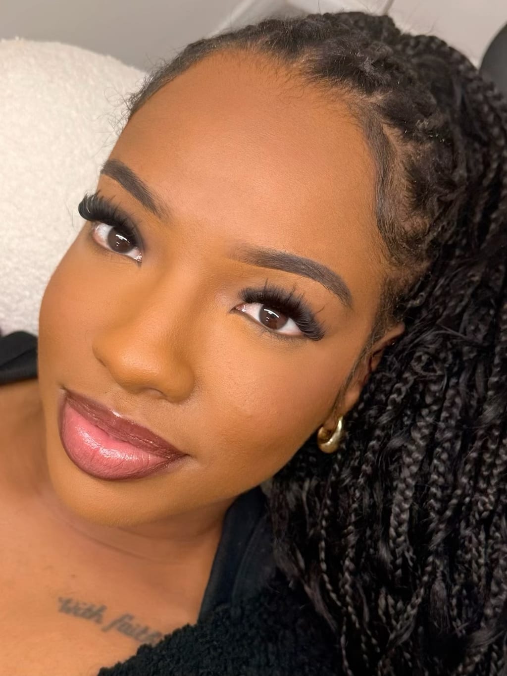 Portrait showing a full Volume lash set with wispy details.
